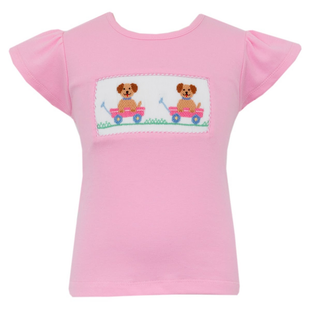 The Pink Knit Puppy Tee by Anavini is a must-have for any fashion-forward child! Made with high-quality pink knit fabric, this shirt features an adorable puppy smocking design! Give your child a stylish and comfortable outfit with this charming tee!