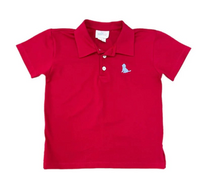 Get your son ready for Summer with this Boys White Polo featuring a cute light blue puppy logo from James &amp; Lottie. Made for boys of all ages, it pairs perfectly with any shorts for a stylish and adorable outfit. Perfect for any Summer celebration or casual day out!