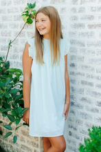 Load image into Gallery viewer, Radiate elegance and grace with our Lottie Dress in Mist from Pleat. Made with a chiffon-like fabric, smocked bodice, and ruffle cap sleeves, this dress is perfect for tween girls. Whether it&#39;s a special event or a day out, this versatile dress will have you looking and feeling your best.
