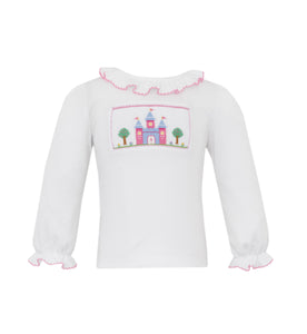 Elevate your little girl's wardrobe with our Girls Castle Smocked Long Sleeve Tunic. Featuring a royal princess castle design smocked onto a light blue knit fabric, this top is fit for a princess. The long sleeves provide warmth and comfort, making it perfect for any occasion.