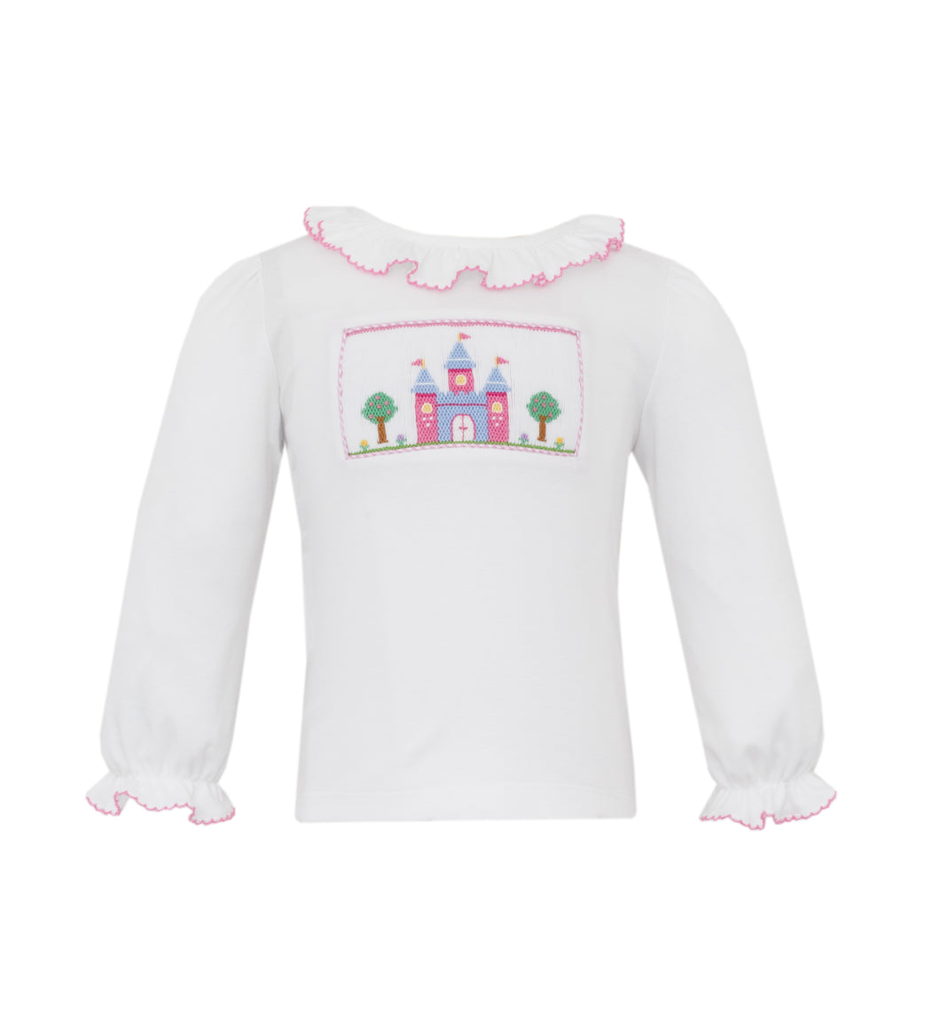 Elevate your little girl's wardrobe with our Girls Castle Smocked Long Sleeve Tunic. Featuring a royal princess castle design smocked onto a light blue knit fabric, this top is fit for a princess. The long sleeves provide warmth and comfort, making it perfect for any occasion.