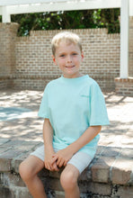 Load image into Gallery viewer, Elevate your young golfer's style with the Boys Golf Club Tee by J Bailey! This vibrant aqua green knit tee, adorned with a charming golf club design on the back, is perfect for spring outings. It combines comfort and fun, making every swing even more exciting!
