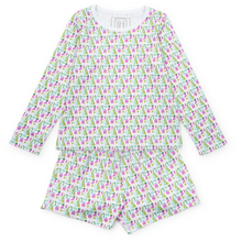Load image into Gallery viewer, Keep her cozy and stylish this holiday with the Sophie Girls&#39; Lounge Short Set in Mod Holiday Pink by Lila &amp; Hayes. This two-piece set features a long-sleeve top paired with comfortable shorts, designed for relaxed yet vibrant loungewear. The fun retro-inspired print adds a playful touch, making it perfect for festive gatherings or cozy days at home. Let her shine this season with a look that’s as cheerful as it is comfortable.
