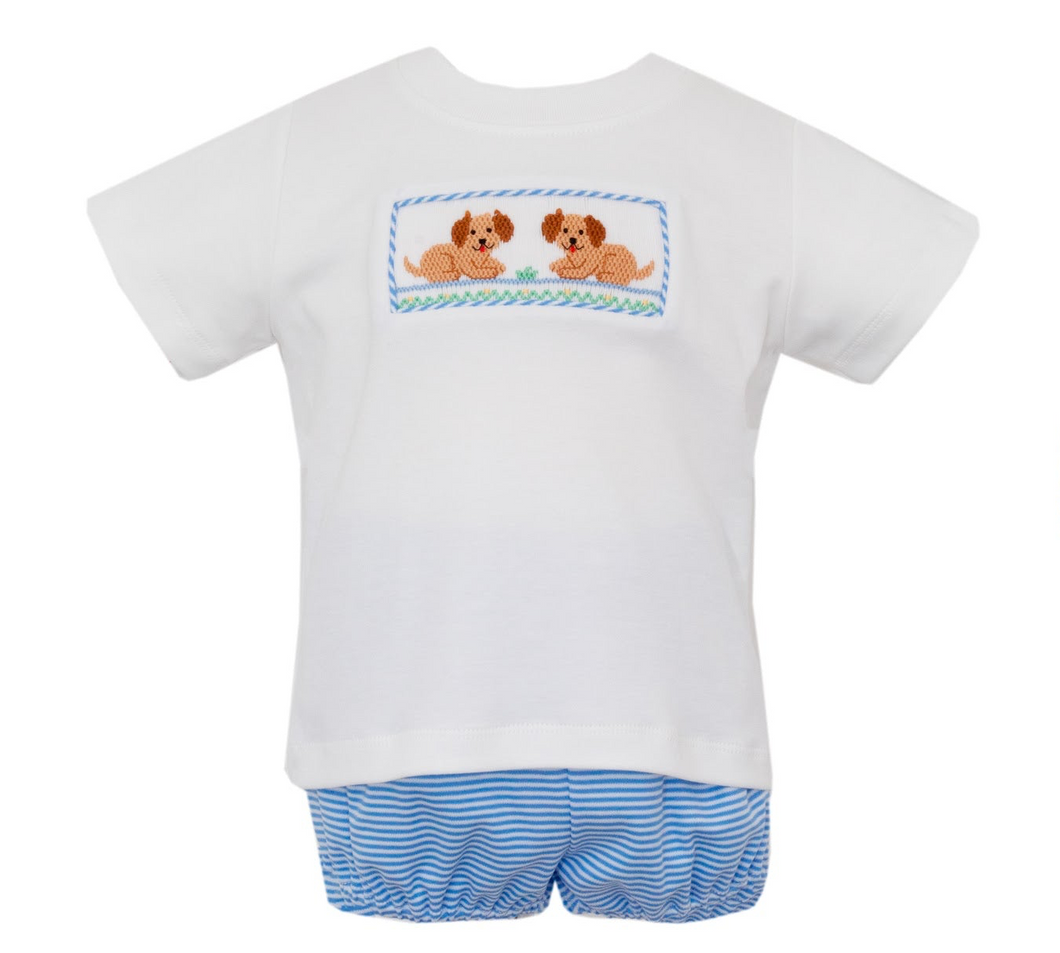 Dress your little one in style with our Boys Puppy Knit Shorts Set by Petit Bebe! The white knit shirt features adorable puppy stitching, while the blue striped knit shorts add a pop of color. Perfect for playtime or special occasions, this set is sure to bring joy to your child's wardrobe.