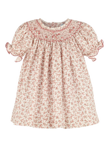 This delightful fall-inspired dress showcases a vintage-like floral pattern that's just perfect for your little princess! With adorable puffy short sleeves, intricate smocking details, and a charming design, the Mulberry floral dress will have your tiny fashionista twirling with joy all season long.