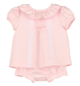 Dress your baby girl in timeless elegance with the Infant Girls Pintuck Lace Bishop in pink. This classic dress features delicate pintuck detailing and lace accents, creating a refined look perfect for special occasions. Soft and comfortable, it highlights your little one’s charm while ensuring she feels cozy. Ideal for celebrations or photo moments, this dress makes every event memorable. Includes matching bloomers.