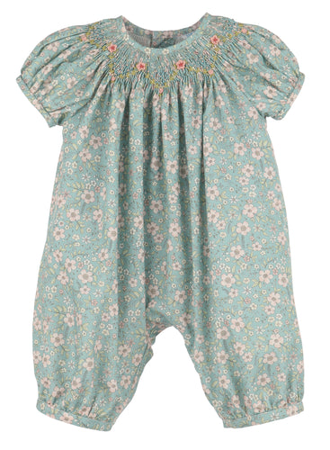 Dress your little one in timeless elegance with the Winter Blooms Aqua Bishop Bubble from Luli & Me. Featuring a delicate floral pattern, a smocked bishop neckline, and intricate embroidered details, this long bubble combines classic style with all-day comfort. Perfect for special occasions, it ensures your child looks charming while feeling cozy and free to move.
