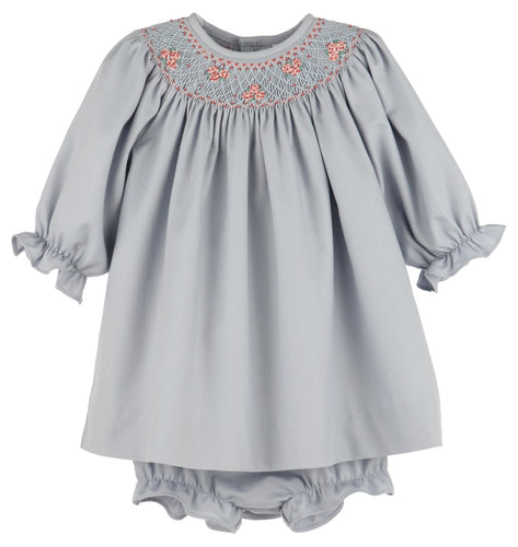 Dress your little one in timeless elegance with the Infant Girls Hydrangea Smocked Bishop by Luli & Me. Featuring exquisite smocking and delicate embroidery along the bishop neckline, this dress adds a touch of sophistication to any fall occasion. Paired perfectly with the matching diaper cover, it ensures comfort without compromising style. Ideal for special events, this charming outfit highlights your infant’s natural beauty while keeping her cozy and looking adorable.