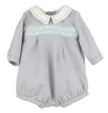 Load image into Gallery viewer, Crafted for timeless charm, this Infant Boys Dusty Blue Smocked Bubble features a classic Peter Pan collar with delicate embroidered borders. The front showcases hand-smocked embroidery, adding a refined touch perfect for special occasions or memorable photo milestones.
