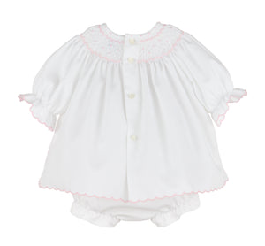 Dress your little one in timeless charm with the Infant Girl's Classic Embroidery Bishop Dress from Luli &amp; Me. This beautiful white bishop dress features delicate hand-smocking and embroidery on the neckline, adding a touch of classic elegance in pink. Complete with a matching bloomers, it ensures both style and comfort for your infant. Perfect for special occasions or festive moments, this dress makes your baby shine with joyful brightness.