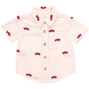 This soft muslin Vintage Car Embroidered Shirt from Blue Rooster is a must-have for boys who love classic cars. The button up design and classic collar add a touch of sophistication, while the embroidered cars bring a fun and unique element to this shirt. Perfect for any young car enthusiast! Pair with our Boys Jackson Short for a versatile look that works for school days, neighborhood games and a family outings alike.&nbsp;