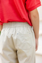 Load image into Gallery viewer, The Prepletic Sheffield Pants in Keeneland Khaki by The Beaufort Bonnet Company blend timeless style with performance fabric, offering comfort and durability for your little one. The classic silhouette and signature stork detail elevate every outfit, perfect for any occasion from playtime to special moments! 
