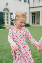 Load image into Gallery viewer, The Proper Peony’s Zinnia Blooms Twirl Dress delights with vibrant floral prints on soft Pima cotton, offering cozy comfort and twirl-worthy style for toddler girls. Perfect for winter holidays, it brings joy and charm to every special moment with effortless grace.
