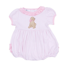 Load image into Gallery viewer, Celebrate every tiny moment in the Puppy Appliqué Bubble by Magnolia Baby. Crafted from soft Pima cotton, its pink check pattern and delicate ruffles create an irresistible charm, while the sweet puppy appliqué sparks joy with every cuddle. Isn’t this the perfect outfit to brighten their day?
