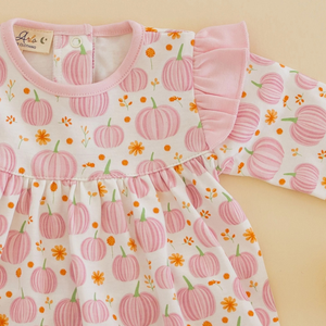 Autumn Blooms Flutters Bubble- A delightful piece for your little one, crafted from luxurious Pima Cotton. This item showcases a beautiful autumn floral print with sweet pink pumpkins that capture the spirit of fall. The long-sleeve design provides extra warmth on cooler days.