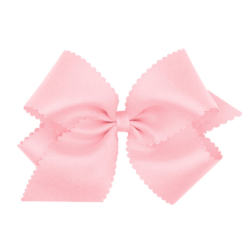 Elevate any outfit with this darling Light Pink Scalloped Bow from Wee Ones. Made from high-quality grosgrain material, this classic bow will add a touch of sweet charm to any look. Available in multiple sizes, it's the perfect accessory to complete your little one's wardrobe. Order now and add a pop of pink to her style!