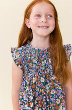 Load image into Gallery viewer, Pink Chicken’s Girls Stevie Dress in True Blue Sketched Floral bursts with vibrant colors and lively florals, making every moment feel joyful and bright. Perfect for tween girls who love playful, spirited style that stands out effortlessly.

