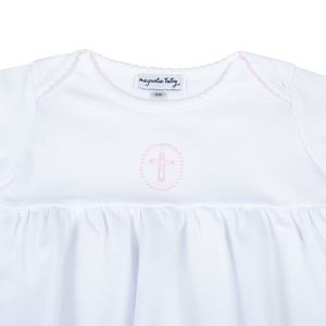 Welcome your little bundle of joy into the world with our Blessed Pink Smocked Gown. Crafted from the softest materials, this gown features a delicate cross stitched in the center of the chest and intricate embroidery on the neckline and sleeves. This simple yet elegant design is sure to become a cherished keepsake for years to come.