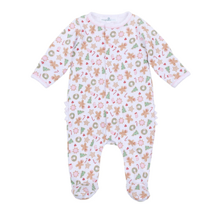 Dress your baby girl in cozy comfort and festive charm with this Frosted Wonderland footie. Made from 100% soft, breathable Pima Cotton, it gently caresses delicate skin while keeping your little one comfortable all day. The delightful all-over print of gingerbread girls, stars, snowflakes, and ruffle back adds a sweet holiday touch, making it the perfect choice for seasonal celebrations and cozy winter moments. Sibling matches available!