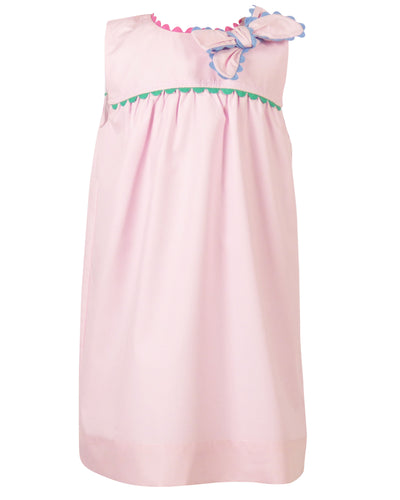Introducing the Annie Bow Dress from The Yellow Lamb, a must-have for toddler girls. This light pink dress features a beautiful bow on one shoulder with colorful ric rac detail. Dress up your little one in style and complete the look for sisters with the matching pantaloon set for infant girls.