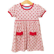 Load image into Gallery viewer, Delight your little one with this charming Apple Print Dress, designed specifically for toddler girls. The playful apple pattern combined with sweet ruffle details creates an irresistible look that&#39;s perfect for back-to-school season. Crafted from comfortable cotton, this Trotter Street dress offers both style and practicality with its short sleeves—ideal for active play while keeping her looking adorable all day long.
