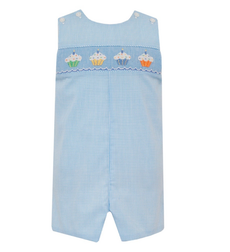 Introducing the sweet and charming Boy's Cupcake Jon Jon by Petit Bebe! Crafted with a blue and white gingham fabric and adorned with precious cupcake stitching, this delightful Jon Jon is perfect for your little one.