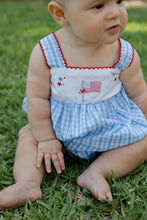 Load image into Gallery viewer, Celebrate freedom and style with the Stars and Stripes Romper by Bailey Boys. This adorable blue gingham romper features charming Stars and Stripes stitching, making it a perfect choice for your little girl this July 4th. Crafted from breathable, comfortable material, it's designed for endless summer fun!
