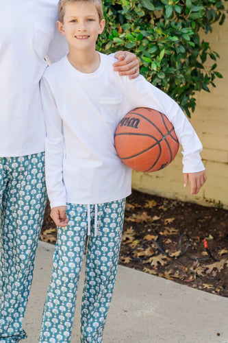 Keep your little athlete comfortable and stylish with the Beckett Boys' Lounge Pant from Lila & Hayes. Featuring a playful basketball print, these pants are perfect for game days or relaxed playtime. Designed with soft, cozy fabric, they offer ease of movement and all-day comfort, making them a winning choice for your active boy’s wardrobe.