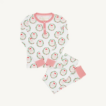 Load image into Gallery viewer, Sutton’s Sweet Dream Set in North Pole Portrait with Richmond Red Stripe is ready for all of the cookie baking mornings, fireside movie marathon evenings, and cozy weekend cuddles the season has in store! Made with 100% Pima Cotton Knit fabric, this set brings a bright, polished touch to every merry memory.&nbsp;
