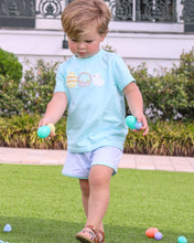 Load image into Gallery viewer, Hop into spring style with this charming Boy's Bunnies &amp; Baskets Short Set from Trotter Street Kids. The soft tee showcases adorable applique baskets and bunnies that capture the magic of the season, while coordinating striped shorts complete the look with effortless coordination.&nbsp;
