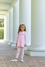 Load image into Gallery viewer, Celebrate the magic of Christmas with the Santa Trio Girls Pant Set by Trotter Street Kids. This charming outfit pairs a soft pink and white striped tee, decorated with adorable Santa appliqués and a delicate Peter Pan collar, with cozy pink pants—designed to bring festive joy and comfort to your little one!

