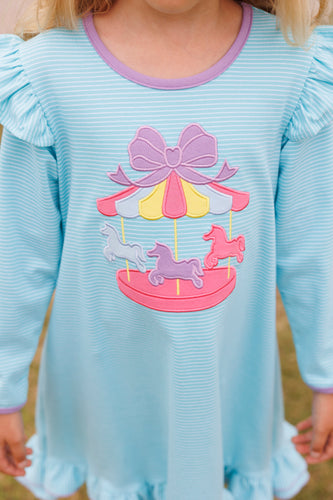Girls Ruffle Carousel Dress from Trotter Street Kids. Crafted from soft cotton, this aqua and white striped dress features charming ruffle details on the hem and shoulders for a playful, feminine touch. The sweet carousel applique adds a whimsical finish.