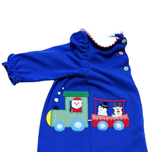 Load image into Gallery viewer, Introduce your little one to the magic of the holiday season with our Christmas Train Louisa Bubble from Zuccini Kids. Featuring a festive Christmas Train applique, a classic peter pan collar, and a cheerful vibrant blue color, this bubble is perfect for toddlers and brings joy to any occasion.&nbsp;
