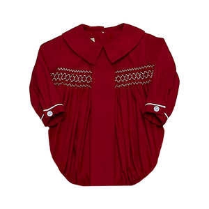 Get your little one ready for the holiday season with our Classic Kent Red Bubble from Zuccini Kids. Made from soft and comfortable Broadcloth, this bubble features a timeless classic collar and charming smocking detail. Perfect for any festive occasion, your baby boy will look adorable and festive in this classic Christmas attire.