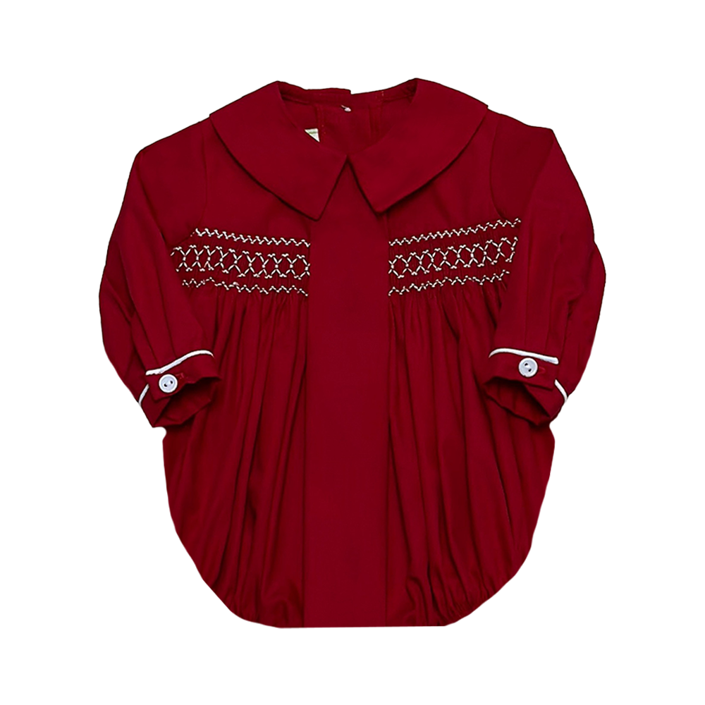 Get your little one ready for the holiday season with our Classic Kent Red Bubble from Zuccini Kids. Made from soft and comfortable Broadcloth, this bubble features a timeless classic collar and charming smocking detail. Perfect for any festive occasion, your baby boy will look adorable and festive in this classic Christmas attire.