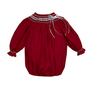 Get your little one ready for the holiday season with our Classic Ribbon Red Bubble from Zuccini Kids. Made from soft and comfortable Broadcloth, this bubble features a timeless classic collar with charming ribbon and smocking detail. Perfect for any festive occasion, your baby boy will look adorable and festive in this classic Christmas attire.