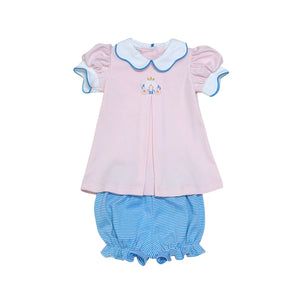 Dress your little princess in the Carriage Ella Bloomer Set from Zuccini Kids, featuring a charming long collared knit tunic with a delicate front pleat and an embroidered magical princess carriage. This adorable outfit pairs perfectly with coordinating bloomers for comfort and style. Ideal for your youngest princess, it also has a matching big sister dress to create a delightful sibling look. Elevate your child's wardrobe with this enchanting and comfortable set today.