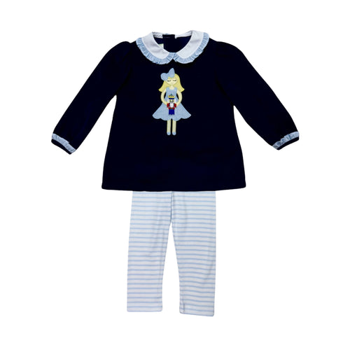 Dress your little one in festive charm with the Toddler Girls Navy Nutcracker Louisa Legging Set from Zuccini Kids. This long-sleeve, navy knee-length tunic features a delicate ruffled Peter Pan collar and a stunning nutcracker applique that brings holiday magic to life. Paired with striped coordinating leggings. Matching sibling looks available.
