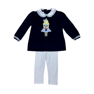 Dress your little one in festive charm with the Toddler Girls Navy Nutcracker Louisa Legging Set from Zuccini Kids. This long-sleeve, navy knee-length tunic features a delicate ruffled Peter Pan collar and a stunning nutcracker applique that brings holiday magic to life. Paired with striped coordinating leggings. Matching sibling looks available.