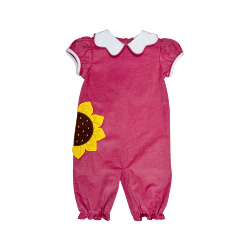 The Sunflower Louisa Corduroy Bubble from Zuccini Kids combines cozy softness with charming details like a sunflower applique and a delicate peter pan collar. Crafted from gentle corduroy, this long bubble suit keeps your little girl comfortable and stylish during fall gatherings. Ideal for infants and young toddlers, it also pairs perfectly with a matching dress for bigger toddlers.