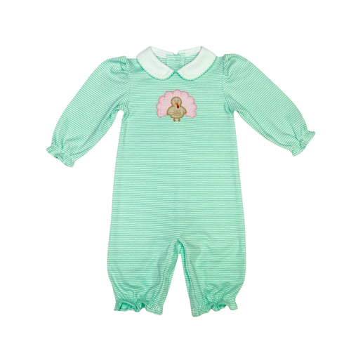 Dress your little one in festive charm with the Infant Girls Turkey Louisa Bubble from Zuccini Kids. Crafted from soft mint and white striped knit fabric, this long bubble features a delightful turkey applique at the front, perfectly capturing Thanksgiving spirit. Comfortable and cute, it’s an ideal outfit for your infant girl to celebrate the holiday in style and coziness.