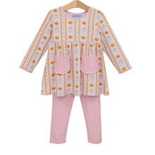 Load image into Gallery viewer, Celebrate pumpkin patch days in the Pumpkin Patch Ruffle Pant Set by Trotter Street Kids. The vibrant orange tunic, sprinkled with charming pumpkins and trimmed with pink pockets, pairs effortlessly with soft pink leggings—crafted for comfort and endless playful adventures!
