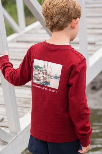 This Boys Harbor Boats Graphic Tee from Saltwater Boys combines comfort and style in a long-sleeve burgundy design perfect for toddlers to tweens. Crafted from soft knit fabric, it features an nautical harbor scene on the back along with a classic SWB logo and pocket on the front, making it an ideal choice for everyday wear or a casual outing. Durable and fashion-forward, this tee ensures your young one looks sharp while staying comfortable throughout the day.