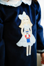 Load image into Gallery viewer, Dress your little one in festive charm with the Toddler Girls Navy Nutcracker Louisa Legging Set from Zuccini Kids. This long-sleeve, navy knee-length tunic features a delicate ruffled Peter Pan collar and a stunning nutcracker applique that brings holiday magic to life. Paired with striped coordinating leggings. Matching sibling looks available.
