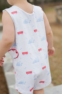 This charming Infant Boy's Puppy Dog Tails Reed Jon Jon from James &amp; Lottie features an irresistible blue, white, and red puppy and wagon print that will captivate everyone's attention. Crafted from comfortable knit fabric, this adorable outfit is perfect for your little puppy enthusiast. Make summer memories even more special with this eye-catching Jon Jon that combines playful style with classic appeal. A must-have addition to your little one's wardrobe!