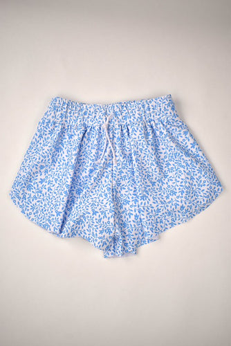 Bring a touch of whimsy to your little girl's wardrobe with the Girls Floral Butterfly Shorts by Funtasia Too! These adorable shorts feature a vibrant blue floral print! Perfect for playtime or special occasions, these shorts will have your girl feeling stylish and comfortable all day long!