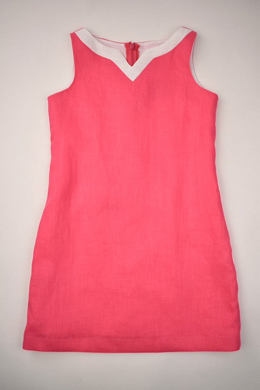 Unleash your young fashionista's vibrant style with the Girls Pink Linen V Neck Dress by Funtasia Too! This hot pink linen dress features a trendy v-neck and is perfect for tween girls who want to make a statement. Comfortable and stylish, it's the perfect addition to any wardrobe.