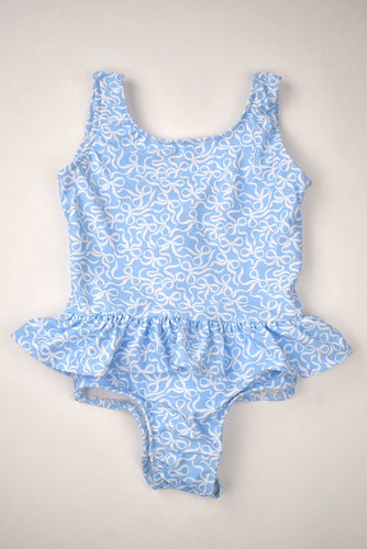 Dress your little one in this adorable Girls Ruffled Bow Swimsuit by Funtasia Too! Featuring a cute blue bow and ruffled design, this swimsuit is perfect for a day at the pool or beach. Made with high-quality materials, it offers both style and comfort. Must-have for any fashion-forward little girl!
