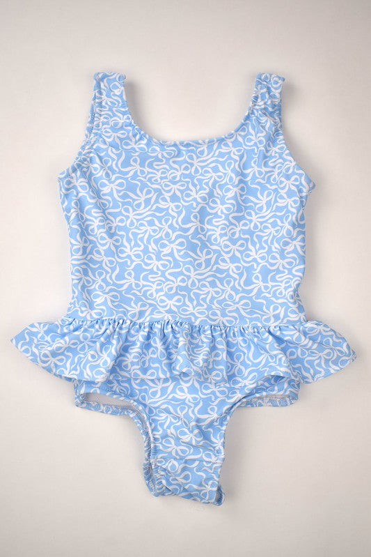 Dress your little one in this adorable Girls Ruffled Bow Swimsuit by Funtasia Too! Featuring a cute blue bow and ruffled design, this swimsuit is perfect for a day at the pool or beach. Made with high-quality materials, it offers both style and comfort. Must-have for any fashion-forward little girl!