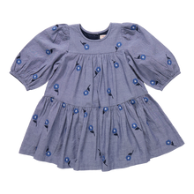 Load image into Gallery viewer, The Girls Fiona Dress in Blue Blossom Embroidery features vibrant embroidered blossom patterns that make your girl truly stand out. Designed with comfort and style in mind, this dress allows for easy movement while adding a magical touch to any occasion. Perfect for celebrations or everyday adventures, it brings a charming blend of elegance and playful style to her wardrobe.
